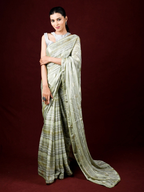 

Exclusiva Green & White Brasso Printed Saree