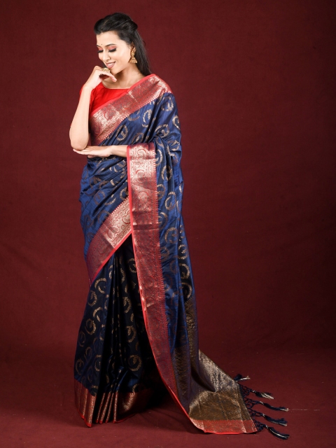 

Exclusiva Navy Blue & Red Floral Zari Silk Blend Saree