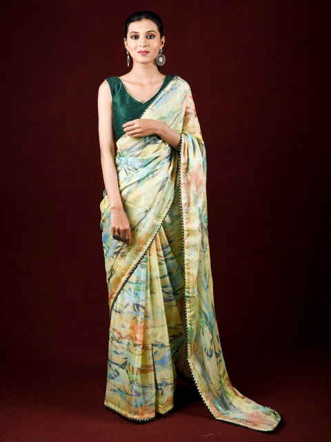 

Exclusiva Beige & Blue Floral Zari Brasso Saree