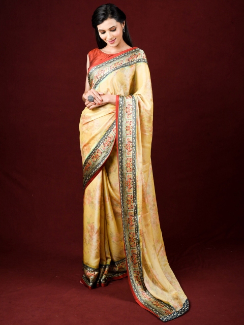 

Exclusiva Yellow & Pink Floral Brasso Saree