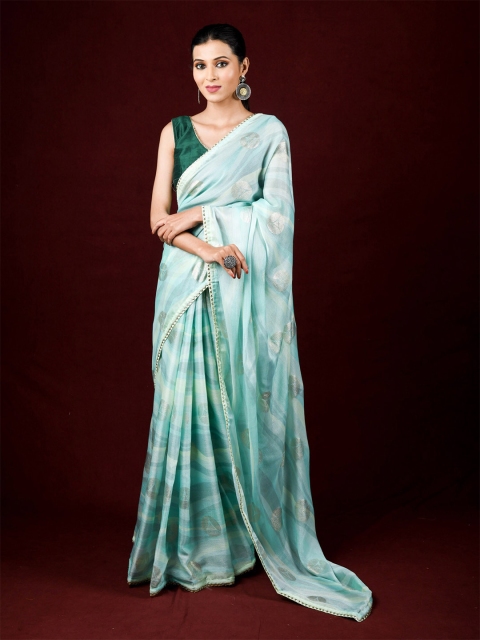 

Exclusiva Blue & Silver-Toned Ethnic Motifs Brasso Saree