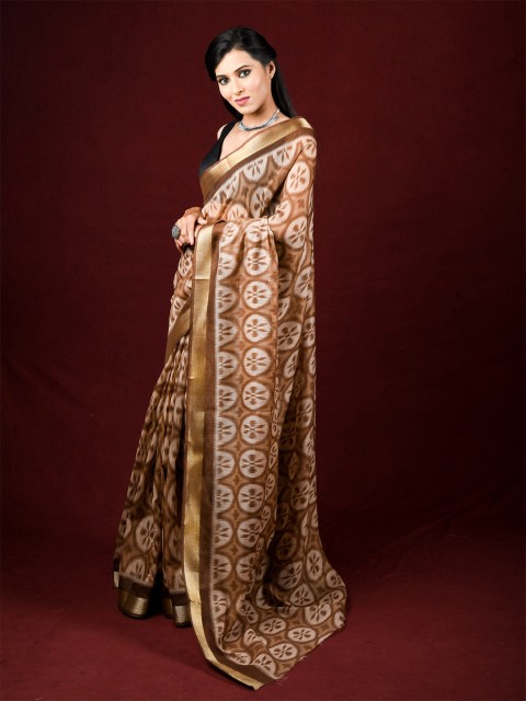 

Exclusiva Brown & Off White Floral Saree