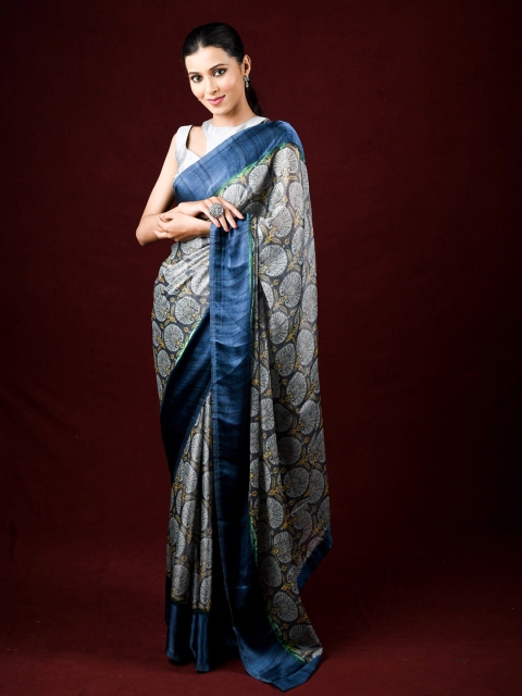 

Exclusiva Blue & Green Ethnic Motifs Brasso Saree