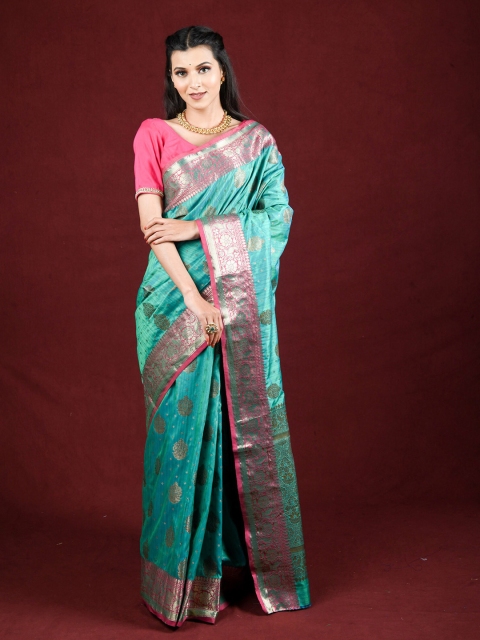 

Exclusiva Green & Pink Ethnic Motifs Zari Saree