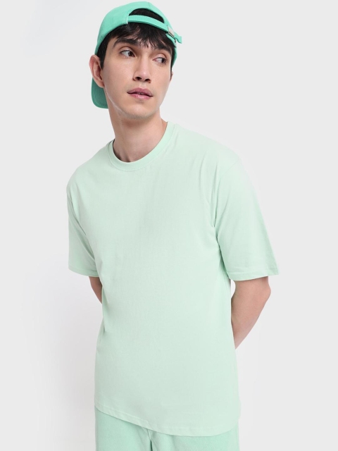 

Bewakoof Men Green Drop-Shoulder Sleeves Loose Cotton T-shirt