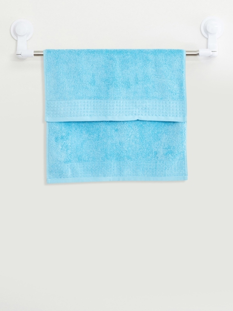 

Home Centre Blue Solid Hand Towel