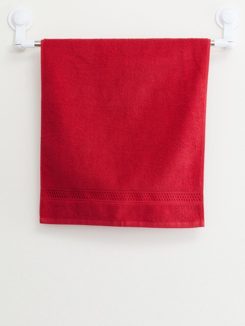 

Home Centre Red Solid 450 GSM Cotton Hand Towel
