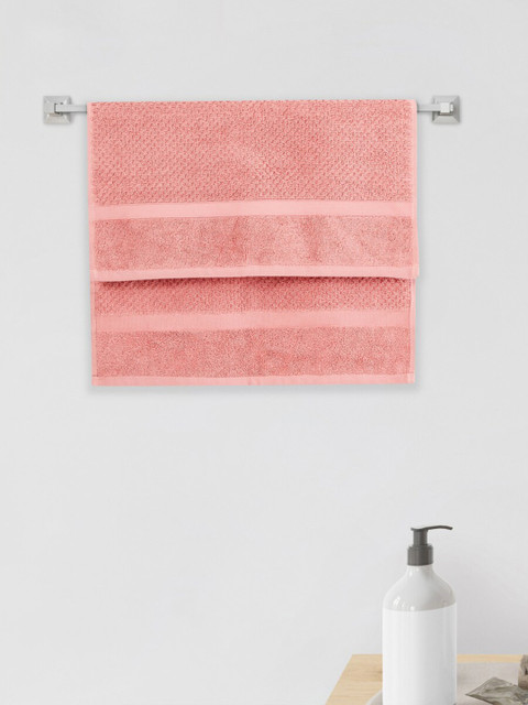

Home Centre Peach-Colored Solid 550 GSM Cotton Hand Towel