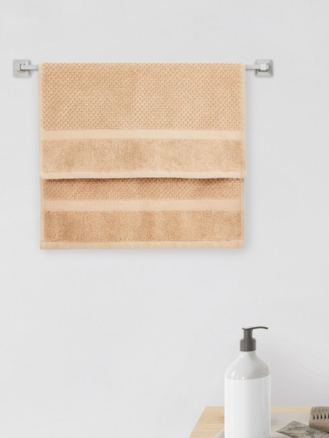 

Home Centre Beige Textured 550 GSM Hand Towel