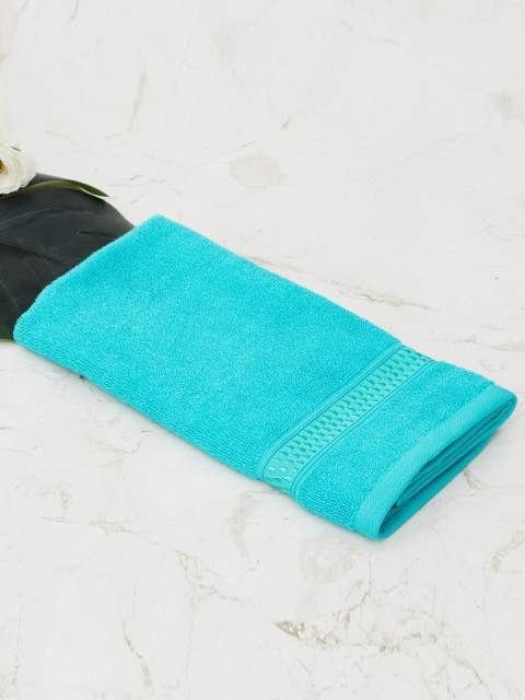 

Home Centre Blue Solid 450GSM Cotton Hand Towel