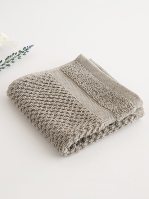 

Home Centre Grey Solid 550 GSM Cotton Face Towel