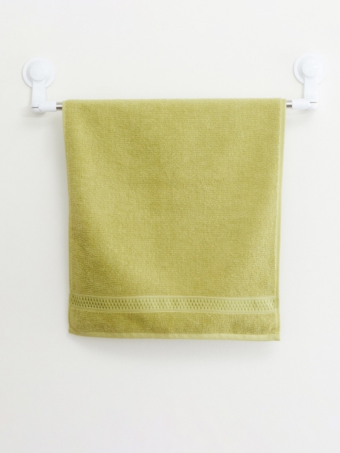 

Home Centre Green Textured 450 GSM Cotton Hand Towel