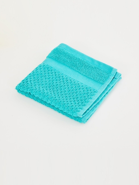

Home Centre Turquoise Blue Solid 550 GSM Cotton Face Towel