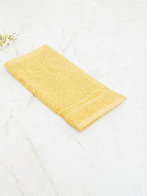 

Home Centre Yellow Solid Cotton 450 GSM Face Towel