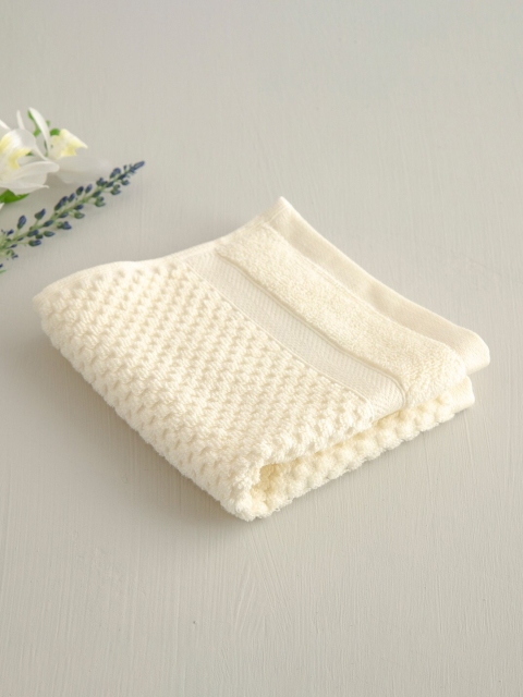 

Home Centre Cream-Colored Textured 550 GSM Cotton Face Towel