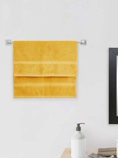 

Home Centre Yellow Solid Textured Cotton 550 GSM Single Hand Towel