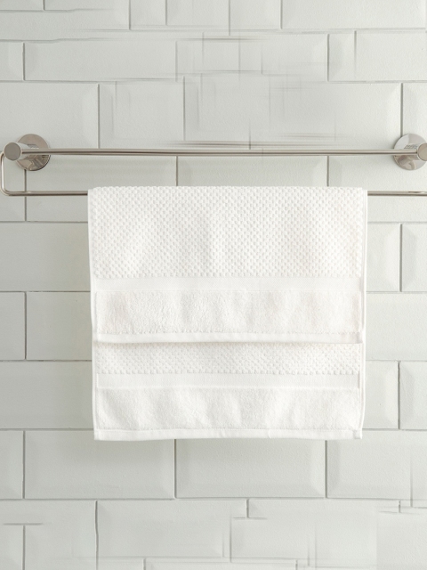 

Home Centre White Textured Cotton 550 GSM Hand Towel