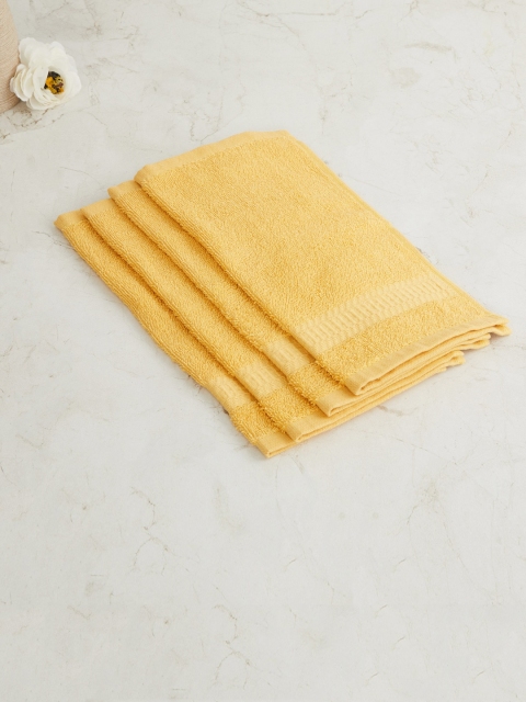 

Home Centre Set Of 4 Yellow 550 GSM Cotton Face Towels