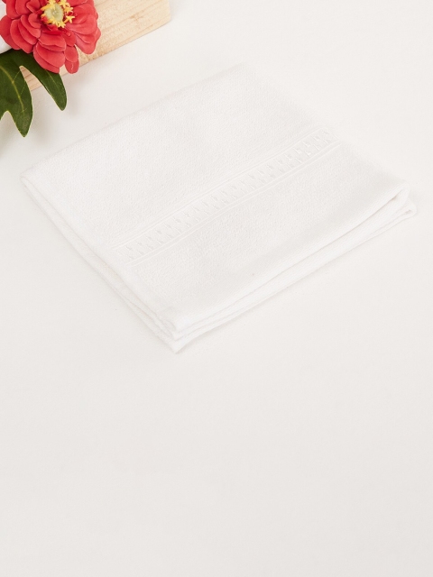 

Home Centre White Solid 450GSM Cotton Face Towel