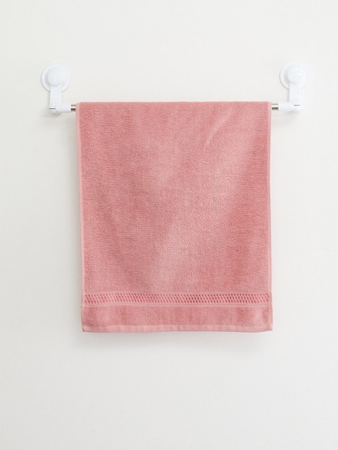 

Home Centre Peach Solid 450 GSM Hand Towel