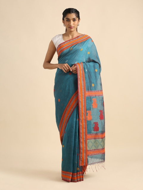 

Taneira Green & Orange Ethnic Motifs Saree