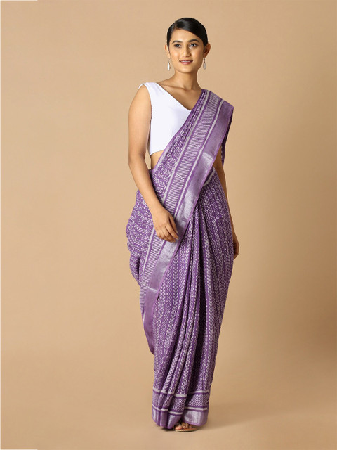

Taneira Purple & White Ethnic Motifs Zari Bagru Saree