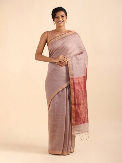 

Taneira Purple & Maroon Zari Linen Blend Saree