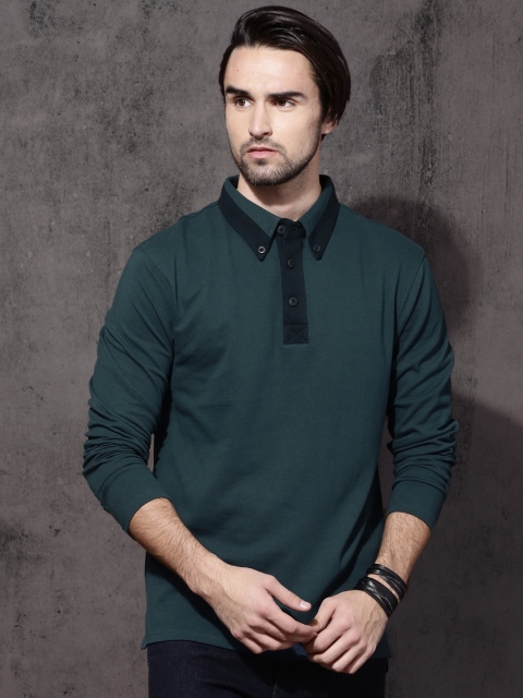 

Roadster Men Teal Blue Solid Polo T-shirt