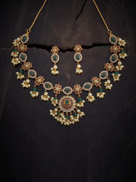 

Kushal's Fashion Jewellery Gold-Toned Green & White Kundan Studded & Beaded Jewellery Set