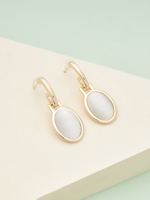 

Kushal's Fashion Jewellery Oval Studs Earrings, Cream