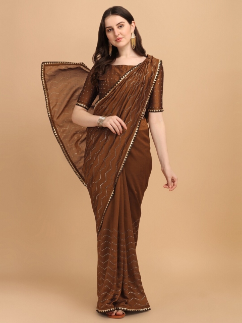 

Amrutam Fab Brown Embellished Beads and Stones Silk Blend Saree