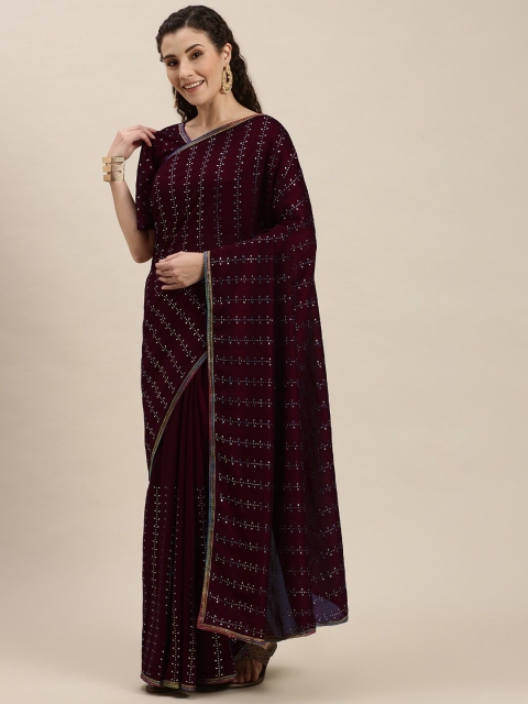 

Amrutam Fab Maroon Embellished Silk Blend Saree