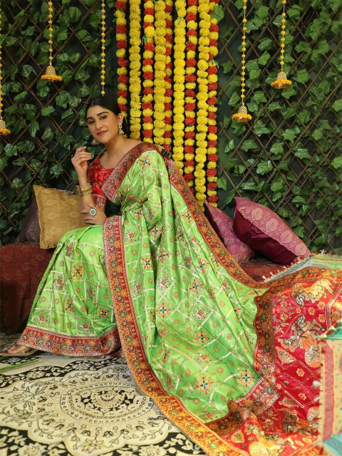 

ASPORA Green And Red Floral Embroidered Heavy Work Patola Saree