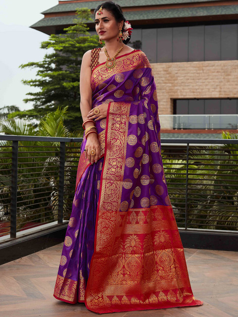 

Mitera Purple & Red Ethnic Motifs Zari Silk Blend Kanjeevaram Saree