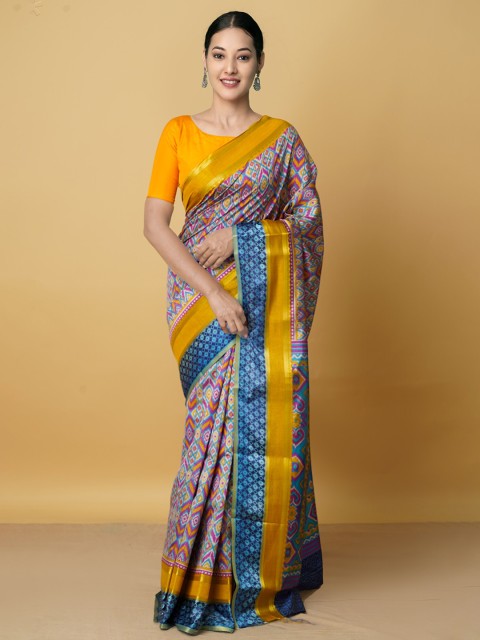 

Unnati Silks Blue & Mustard Floral Zari Printed Patola Saree