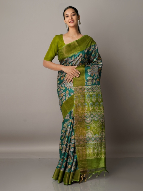 

Unnati Silks Green Floral Zari Pure Silk Tussar Saree