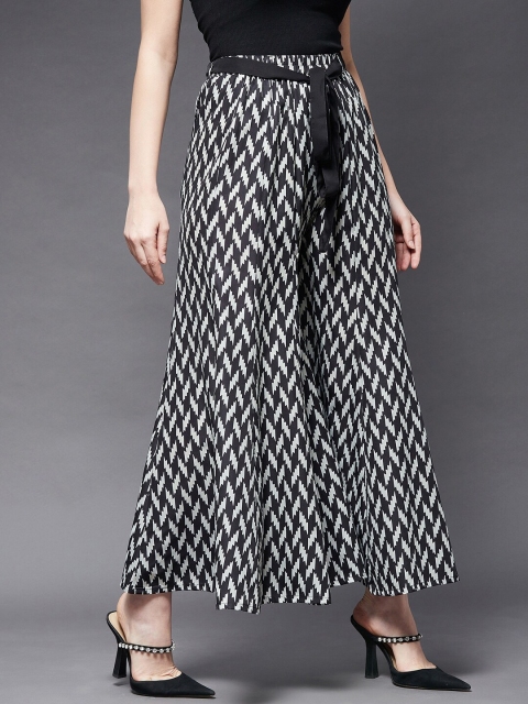 

Azira Women Black & White Printed Flared Crepe Ethnic Palazzos