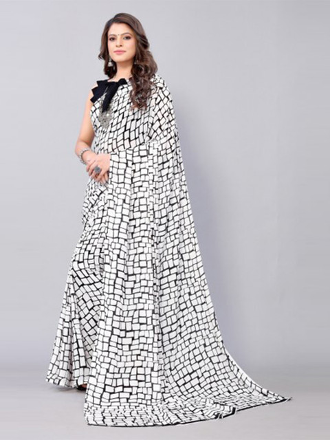 

Yashika Black & White Georgette Saree