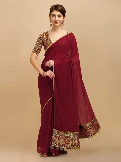 

CLOMITA Maroon & Gold-Toned Ethnic Motifs Saree