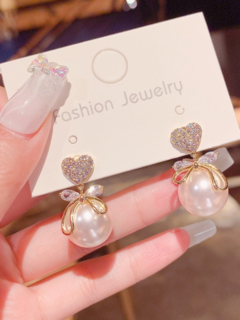 

Vembley Women Gold-Toned Contemporary Drop Earrings