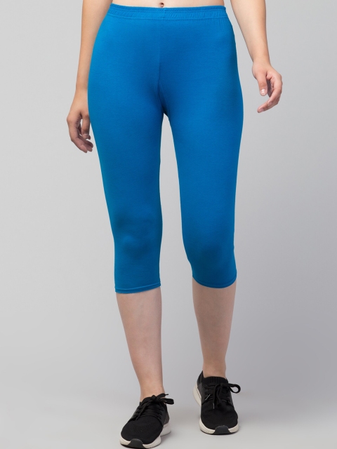 

Apraa & Parma Women Solid Cotton Skinny Fit Capris, Blue