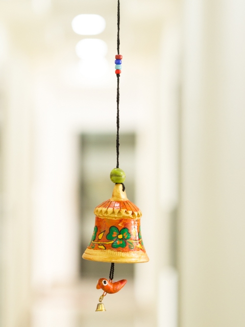 

ExclusiveLane Terracotta Handpainted & Handmade Decorative Wind Chime, Orange
