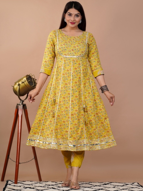 

UNISETS Women Mustard Yellow Floral Printed Empire Kurta with Trousers & With Dupatta