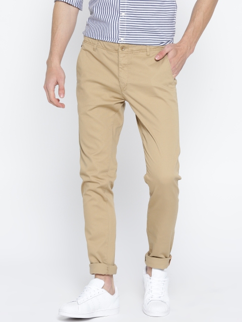 

Blackberrys Men Beige Self-Design Trousers