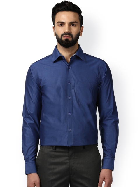 

Raymond Men Blue Regular Fit Solid Formal Shirt