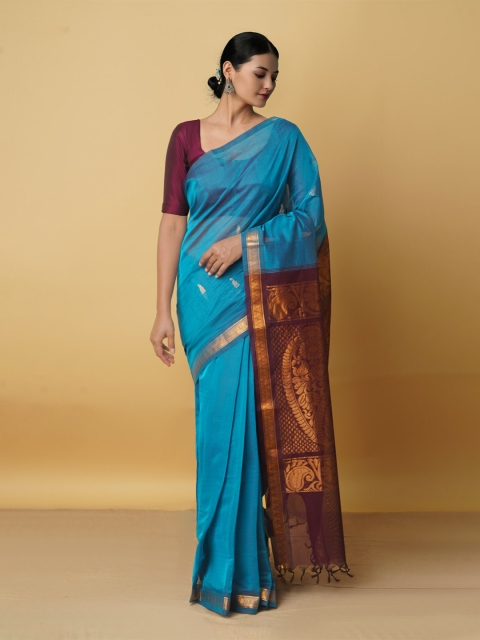 

Unnati Silks Blue & Maroon Ethnic Motifs Zari Pure Cotton Venkatgiri Saree