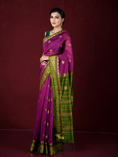 

Exclusiva Purple & Green Woven Design Zari Banarasi Saree