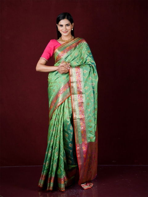 

Exclusiva Green & Pink Woven Design Zari Silk Blend Banarasi Saree