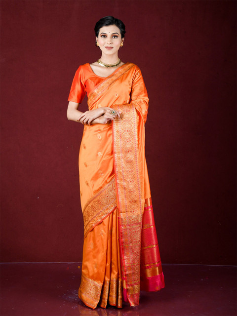 

Exclusiva Orange & Red Woven Design Zari Silk Blend Banarasi Saree
