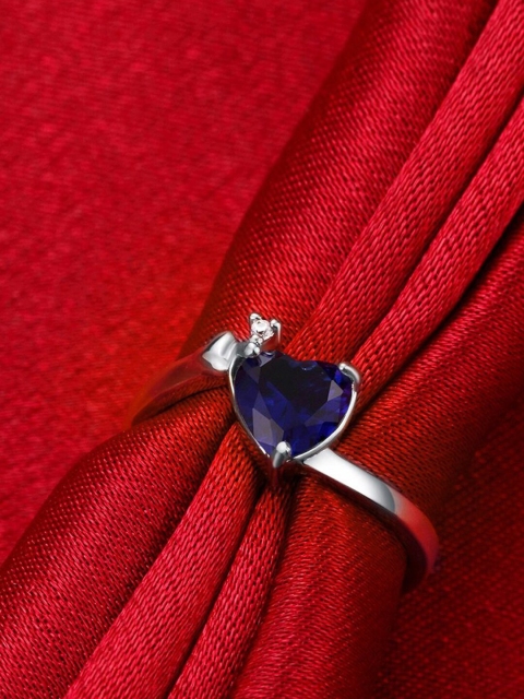 

Designs By Jewels Galaxy Silver-Plated & Toned Blue CZ Studded Adjustable Finger Ring